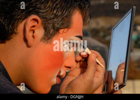 Clown applying make-up, Oaxaca de Juarez, Oaxaca, Mexico, North America Stock Photo