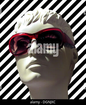 Modern mannequin wearing sunglasses Stock Photo