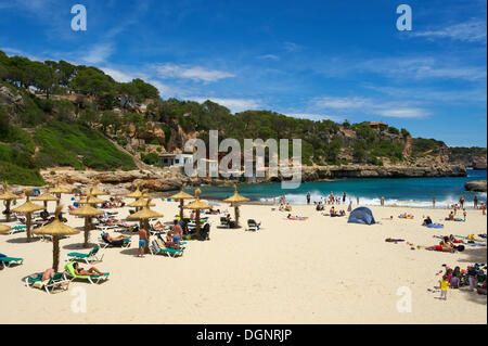 Tourists on the beach in the bay at Cala Llombards, Cala Llombards, Santanyi, Majorca, Balearic Islands, Spain Stock Photo