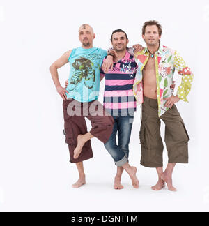 Three friends arm in arm Stock Photo