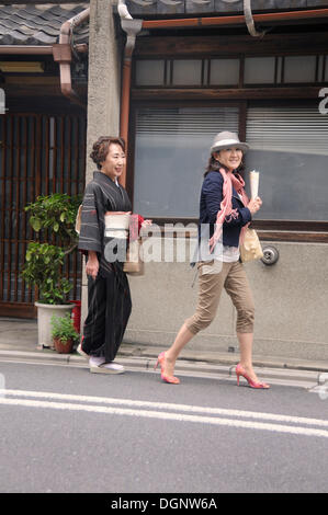 Modern and traditional dressed Japanese women, Kyoto, Japan, East Asia, Asia