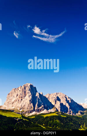 View during climb to Mt Sass Rigais overlooking to Mt Langkofel and Mt Plattkofel above Groedental or Val Gardena valley Stock Photo