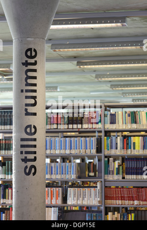 Catholic University of Leuven Arenberg Library, Leuven, Belgium. Architect: Rafael Moneo, 2002. Book stacks with concrete pillar