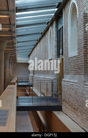 Catholic University of Leuven Arenberg Library, Leuven, Belgium. Architect: Rafael Moneo, 2002. Internal bridge between original Catholic University of Leuven Arenberg Library, Leuven, Belgium. Architect: Rafael Moneo, 2002. Internal bridge between original