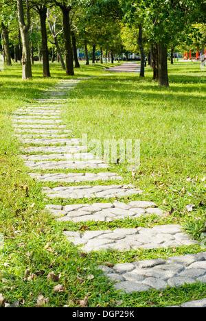Stone walkway, trees, in the park Stock Photo