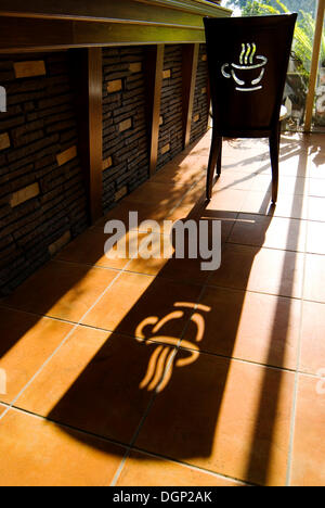 Chair with coffee logo and long shadow Stock Photo
