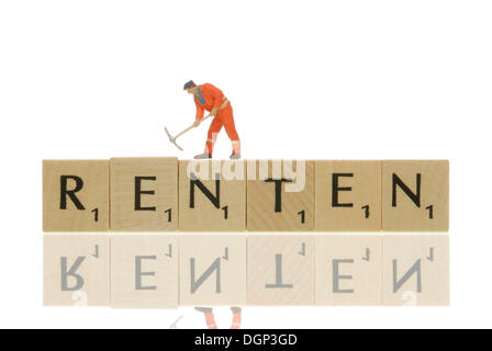 Figurine of contruction worker on the lettering 'Renten', German for pension, symbolic for the pensions being a building site