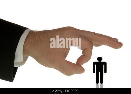 Business man flipping away a male black figure Stock Photo