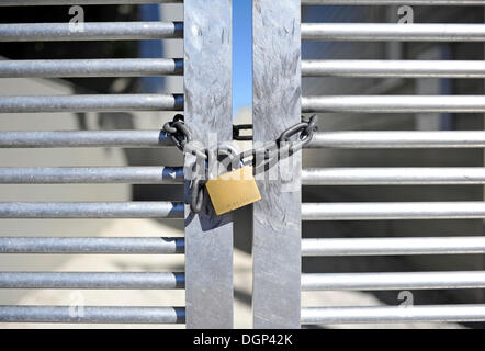 Closed gate with chain and padlock Stock Photo