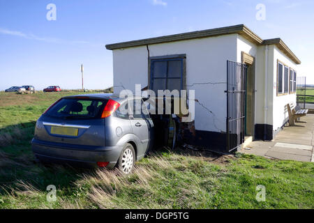 Redcar and Cleveland, UK . 24th Oct, 2013. A  woman driver has driven her car off the road and collided with Public Toilet block severely damaging the car and the Building. The accident happed about 11.30 a.m. 24/10/2013 in bright clear weather Credit:  Peter Jordan NE/Alamy Live News Stock Photo