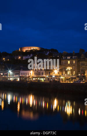 Oban with the promenade and McCaig's Tower at night, Argyll, Scotland, United Kingdom, Europe Stock Photo