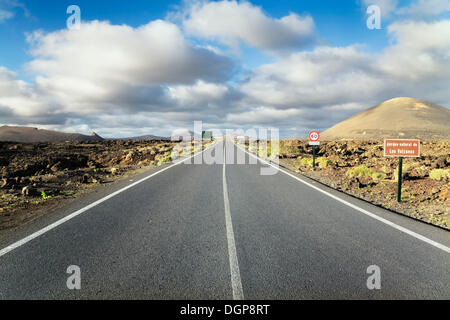 Road through the Parque Natural de Volcanos with the Montana Negra, Lanzarote, Canary Islands, Spain, Europe Stock Photo