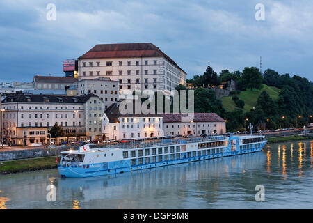 TUI Maxima, a cruise ship floating on the Danube river, Linz Castle at the back, Linz, Upper Austria, Austria, Europe Stock Photo