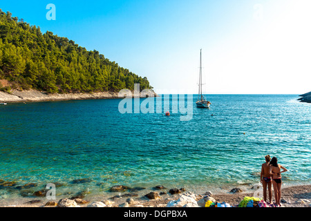 Tourists relaxing on Pupnatska beach near Pupnat, Croatia Stock Photo