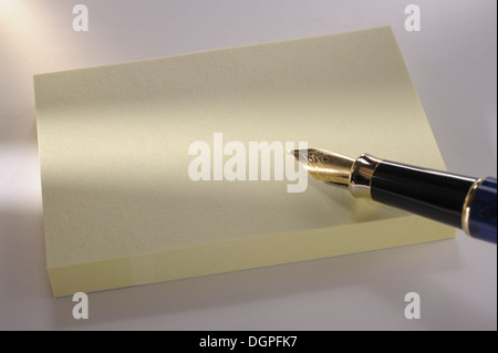 paper sheet with pen as blank memo Stock Photo