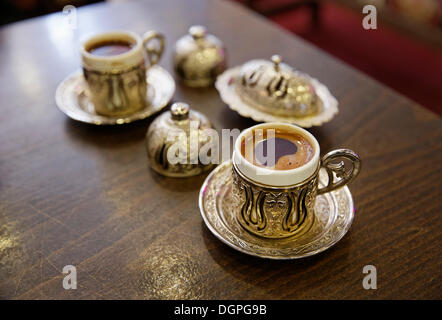 Mocha, Turkish coffee in traditional golden cups, Old City Sultanahmet, Istanbul, Turkey, Europe Stock Photo