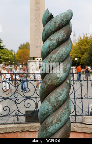 Serpentine Column, in the rear the Obelisk of Thutmosis III, Hippodrome or At Meydani square, Istanbul, European side Stock Photo