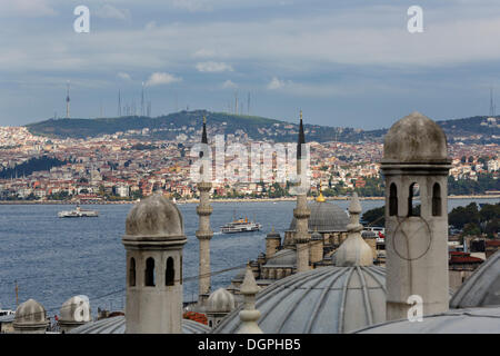 View of Süleymaniye Mosque across the Rüstem Pasha Mosque and the Bosphorus to Üsküdar on the asian side of the city Stock Photo