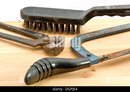 old used tools on the wooden desk Stock Photo