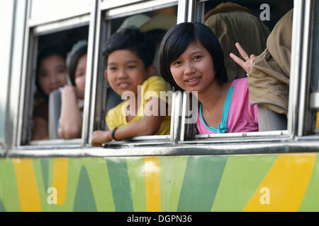 Schoolgirls on a bus, Bago, Bago Town, Bago, Myanmar, Burma Stock Photo
