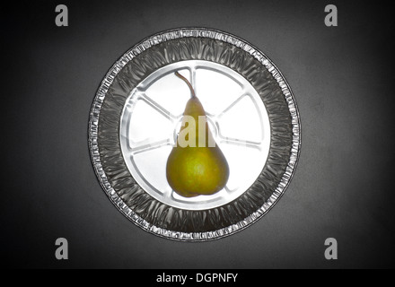 Pear In Metal Pie Plate Stock Photo
