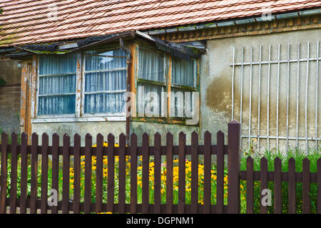 Garden fence and conservatory of an old farmhouse in Phoeben, near Werder an der Havel, Brandenburg Stock Photo