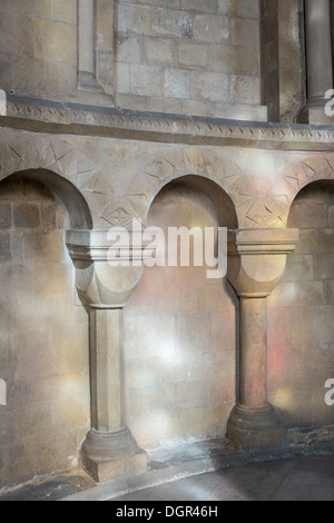 Stonework Canterbury Cathdral, Light Through Stained Glass Shines on the Wall. Stock Photo