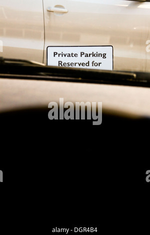 Car parked in reserved space from in car