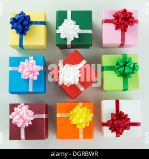 Various colour gift boxes wrapped with ribbons and bow Stock Photo