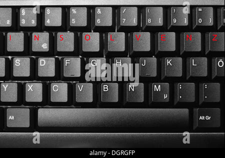 Keyboard with word 'Insolvenz', insolvency in red Stock Photo