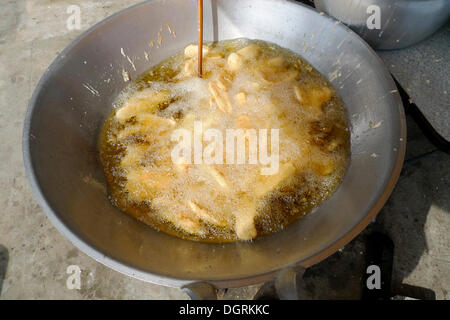 Bananas in boiling oil, Hue, Thailand, Asia Stock Photo