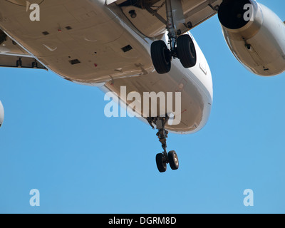 detail of landing airplane - bottom view Stock Photo