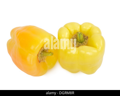 two fresh yellow peppers, studio shot, isolated on white background Stock Photo