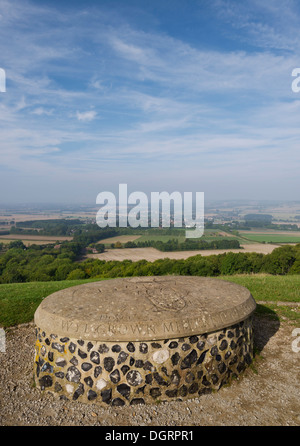 The Wye Crown Millennium Stone overlooking the village of Wye on a sunny morning. Stock Photo