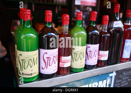Young wine at Naschmarkt stall, Vienna, Austria, Europe Stock Photo