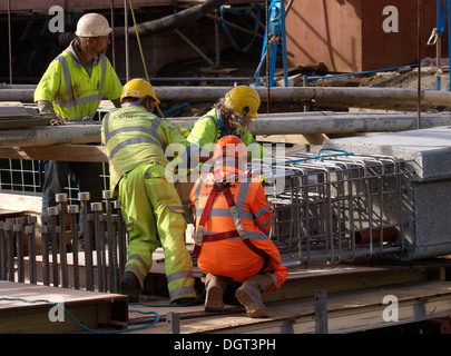 Construction workers on the new bridge project, Bude, Cornwall, UK Stock Photo