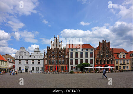 Historic gabled houses on Markt square, the second house from the left is a town house with a stepped gable, brick architecture Stock Photo