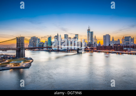 Famous view of New York City over the East River towards the financial district in the borough of Manhattan. Stock Photo