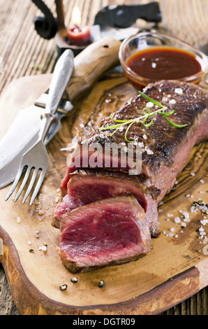 beef steak on the wooden board Stock Photo