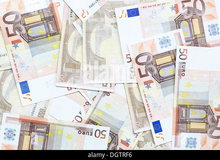 fifty euro banknotes scattered on the floor Stock Photo