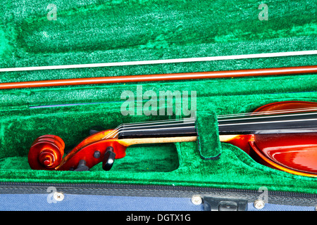 violin in modern green case Stock Photo