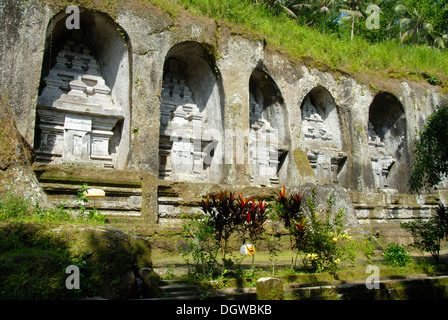 Bali Hinduism, ancient rock sanctuary, five Candi monuments carved as reliefs on rock, Gunung Kawi Temple, Tampasiring near Ubud Stock Photo