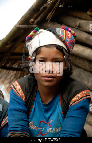 Portrait of girl of the Mouchi ethnic group wearing traditional clothes, T-shirt with Sweet Heart writing and coloured turban Stock Photo