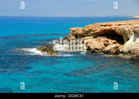 Photo of cliffs with rocks and sea in distance in Sommaroy in Norway ...