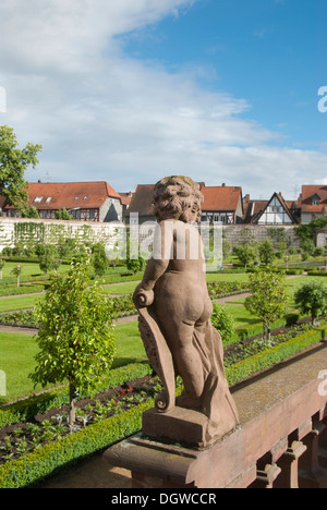 Baroque, sandstone cherub, convent garden, Basilica of St. Marcellinus and Peter, former Benedictine monastery, Seligenstadt Stock Photo