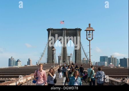 Pedestrians on Brooklyn Bridge, bridge pillar, New York City, USA, North America, America Stock Photo