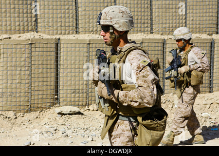 U.S. Marine Corps Lt. Col. Daniel Wittnam, battalion commander of 3rd Battalion, 7th Marine Regiment, patrols in Lashkar Gah, Helmand province, Afghanistan Oct. 17, 2013. Wittnam traveled to Lashkar Gah to visit Marines with the Security Force Attachment