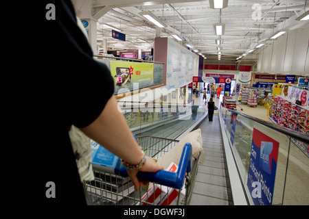 Tesco Extra store Barrow in Furness on moving walkway escalator