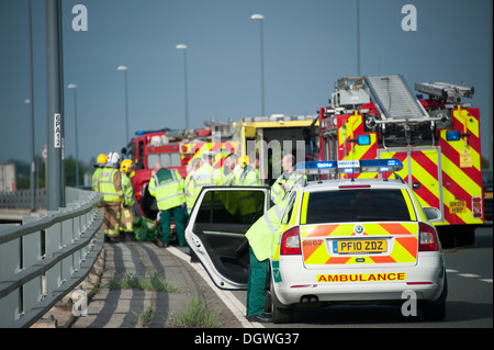 Car crash on Motorway Ambulance Fire Paramedic Stock Photo