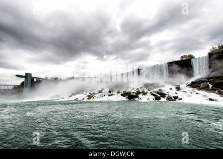 NIAGARA, NY - The American Falls, seen from water level, at Niagara Falls on the Niagara River on the border between the United States and Canada. Stock Photo